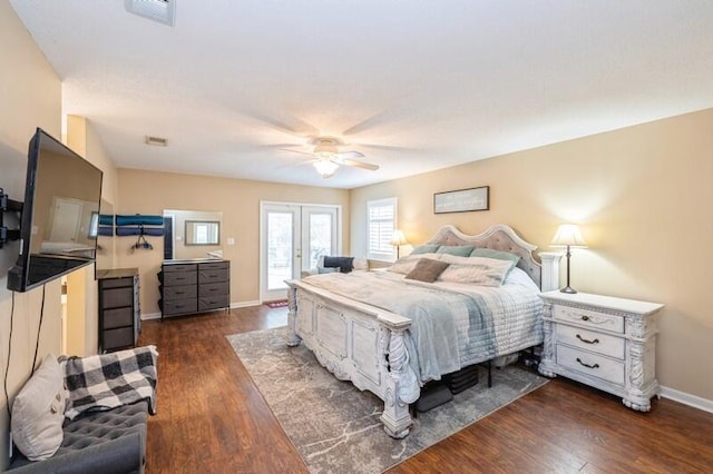 bedroom featuring ceiling fan, dark hardwood / wood-style floors, and french doors