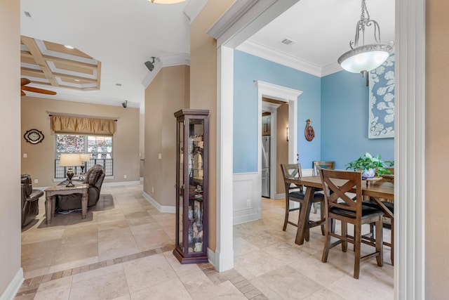 hall featuring ornamental molding and coffered ceiling