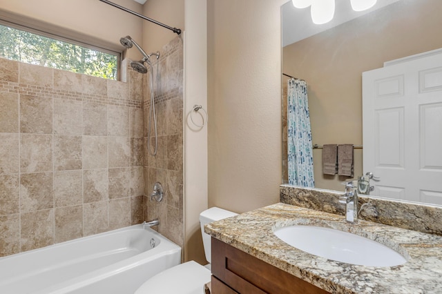 full bathroom featuring vanity, toilet, and shower / bath combo with shower curtain