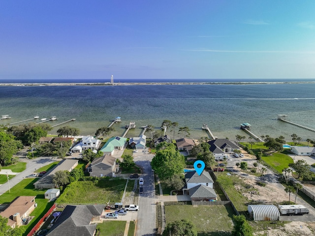 bird's eye view with a water view