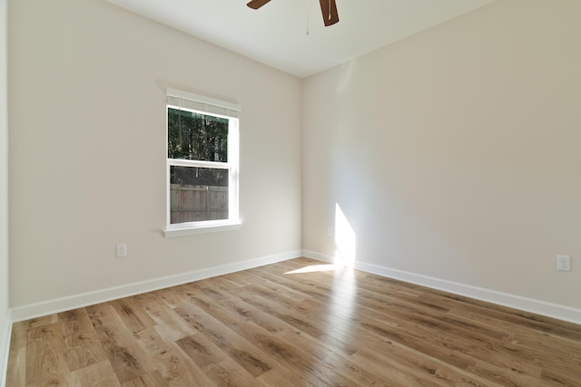 unfurnished room featuring ceiling fan and light hardwood / wood-style flooring