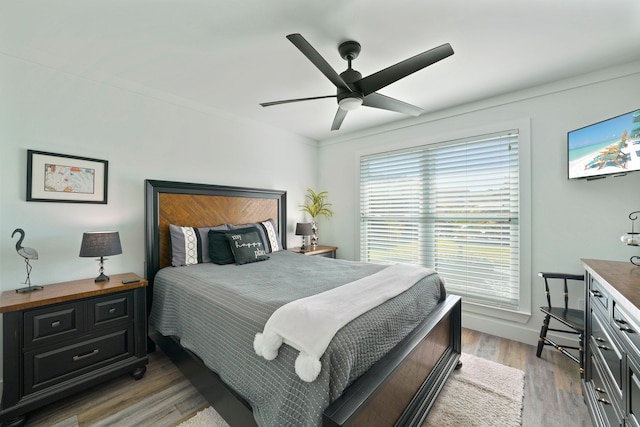 237 Sandy Cay Dr, Miramar Beach, FL 32550 - bedroom featuring light wood-type flooring, a ceiling fan, and baseboards