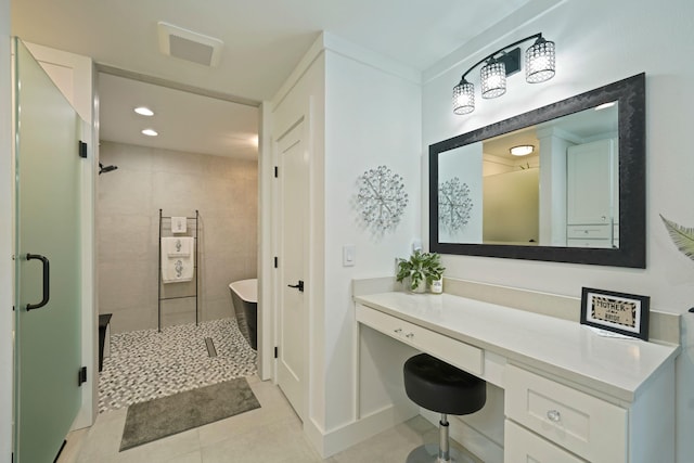 bathroom with tile patterned flooring and independent shower and bath