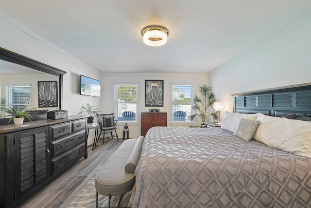 237 Sandy Cay Dr, Miramar Beach, FL 32550 - bedroom featuring wood finished floors and crown molding