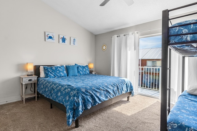 carpeted bedroom featuring a textured ceiling, ceiling fan, and vaulted ceiling