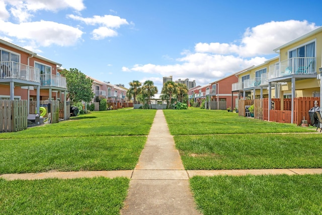 view of home's community featuring a yard