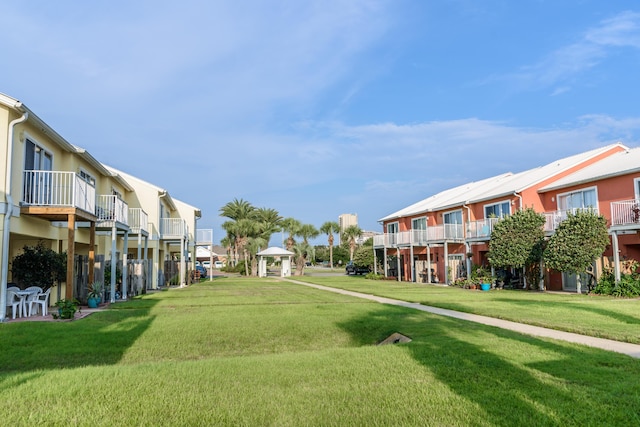 view of property's community featuring a gazebo and a yard