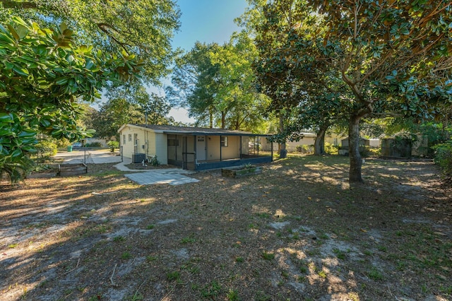 view of outdoor structure featuring central AC