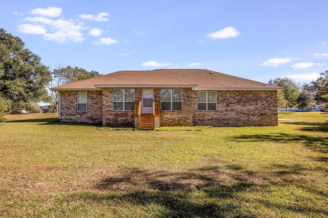 view of front of property with a front lawn