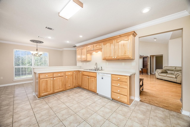 kitchen featuring pendant lighting, white dishwasher, crown molding, light tile patterned floors, and a notable chandelier