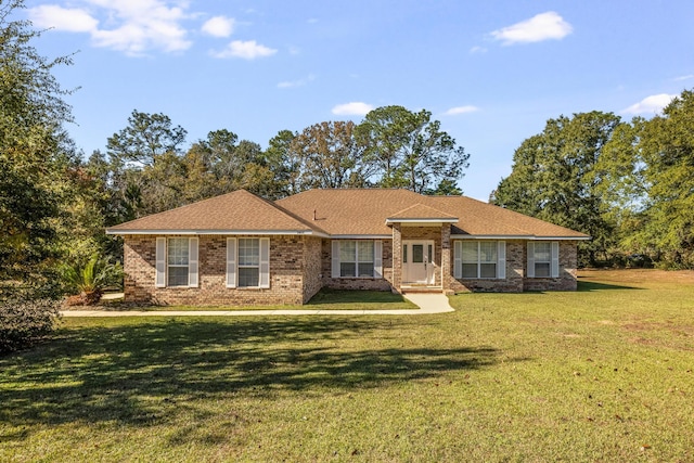 single story home featuring a front yard