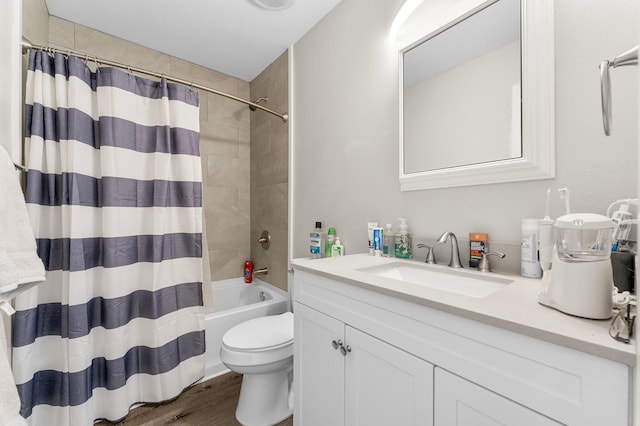 full bathroom with toilet, vanity, shower / bath combo, and hardwood / wood-style flooring