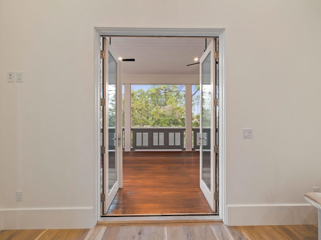 doorway featuring wood-type flooring