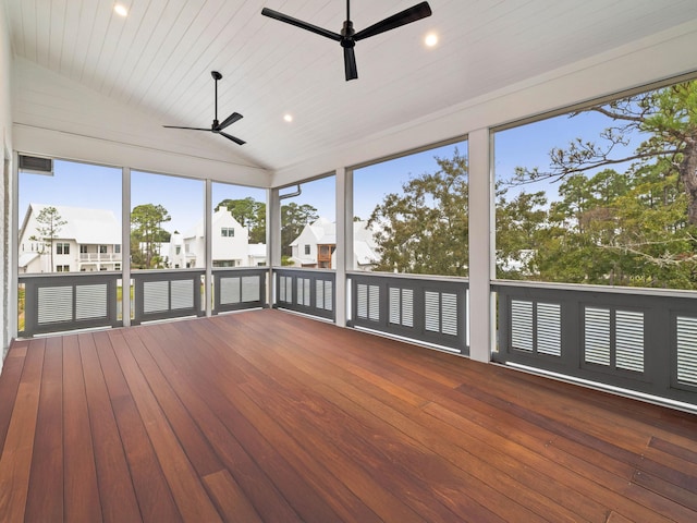 unfurnished sunroom with wooden ceiling, ceiling fan, and lofted ceiling