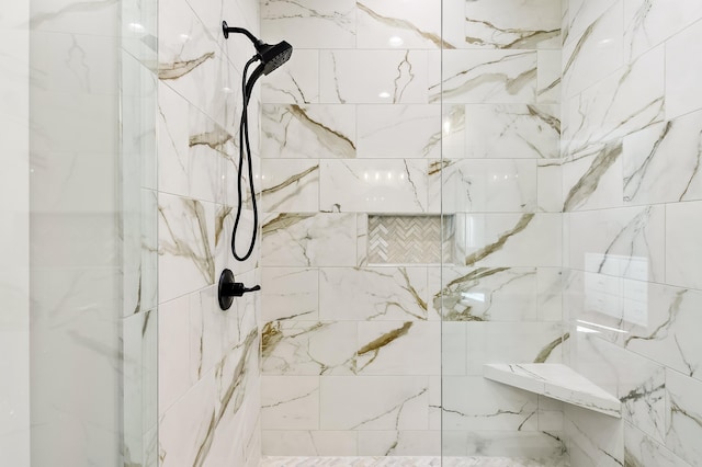 details featuring a tile shower