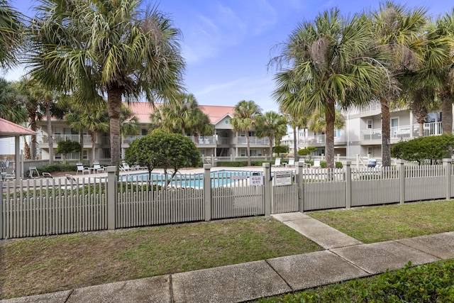 view of community with a swimming pool