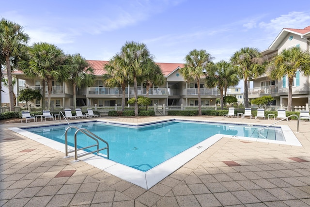 view of swimming pool featuring a patio