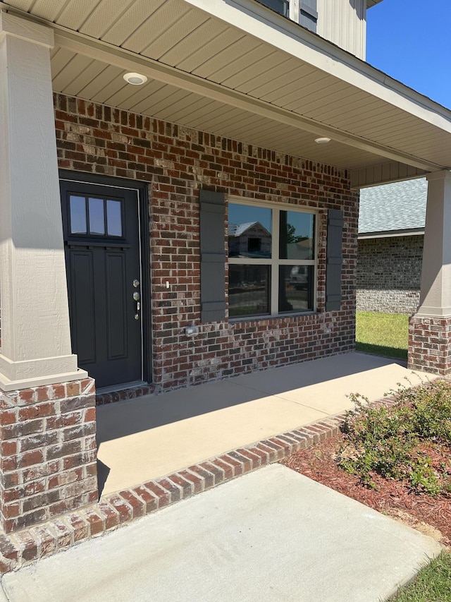 doorway to property featuring a porch