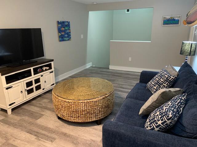 living room with hardwood / wood-style flooring