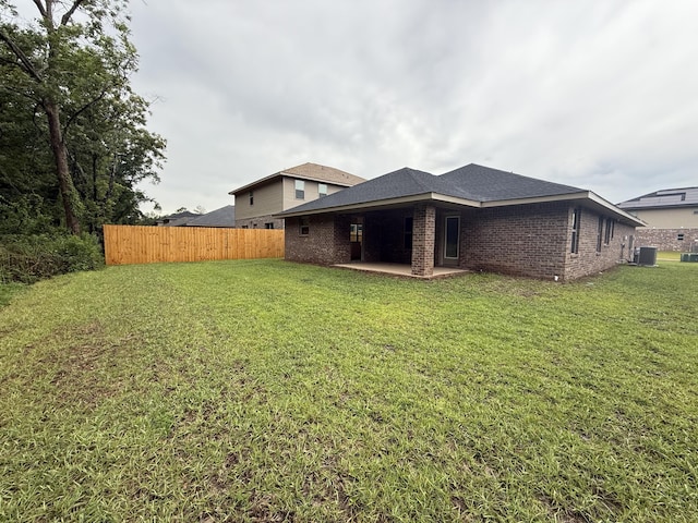 150 Ridgeway Cir, Crestview, FL 32536 - rear view of property with a patio area and brick siding