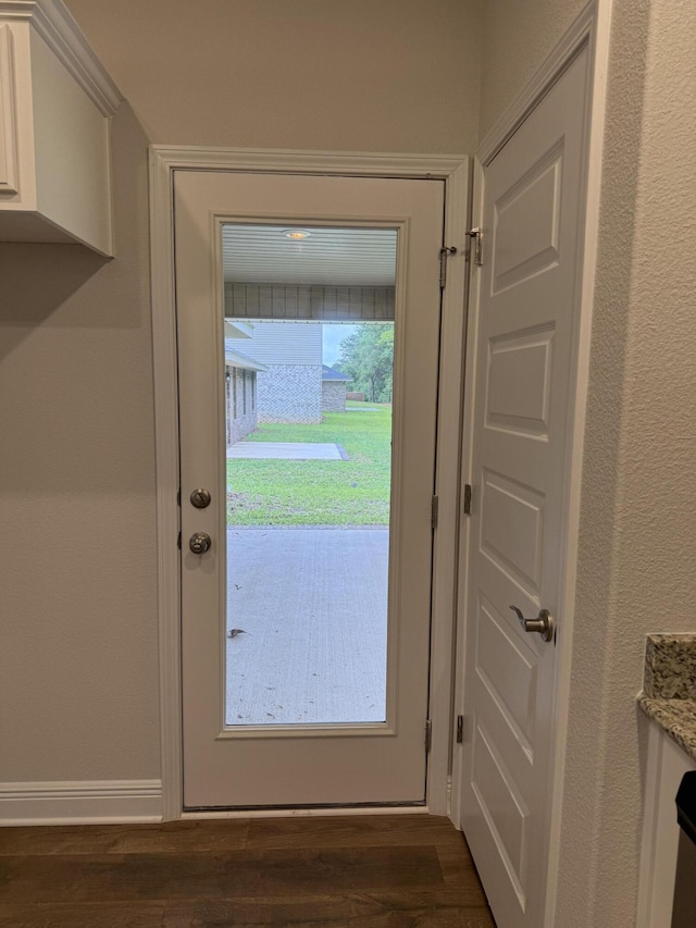 150 Ridgeway Cir, Crestview, FL 32536 - doorway to outside featuring dark wood finished floors