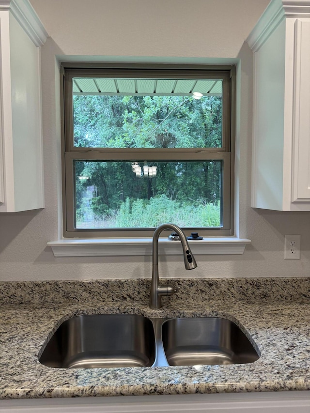 150 Ridgeway Cir, Crestview, FL 32536 - kitchen view of white cabinetry and light stone counters