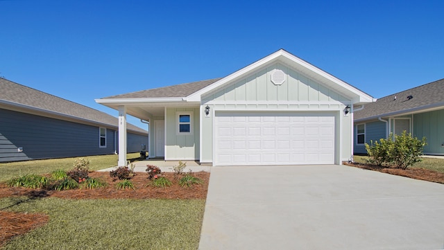 ranch-style home with a garage and a front lawn