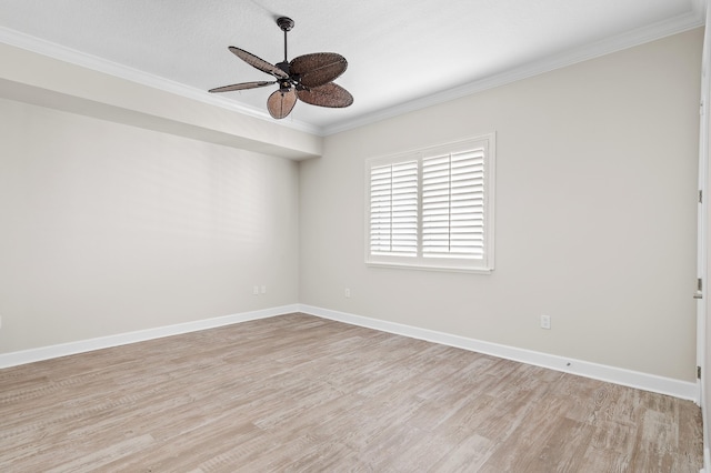 empty room with a textured ceiling, ceiling fan, crown molding, and light hardwood / wood-style flooring