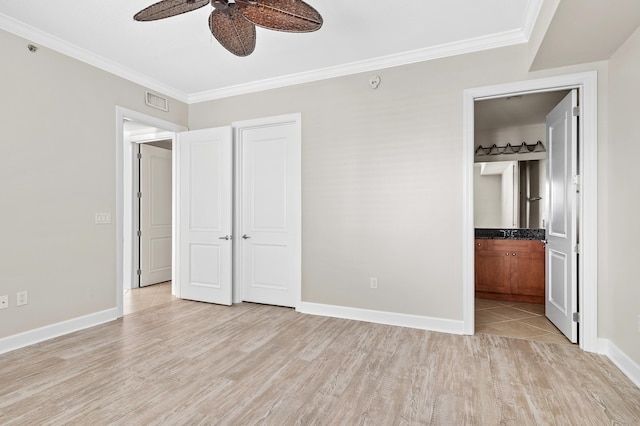 unfurnished bedroom featuring ensuite bath, ceiling fan, light hardwood / wood-style flooring, and ornamental molding