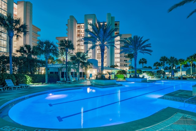 view of community with a patio area and a swimming pool