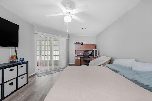 bedroom featuring ceiling fan and light wood-type flooring