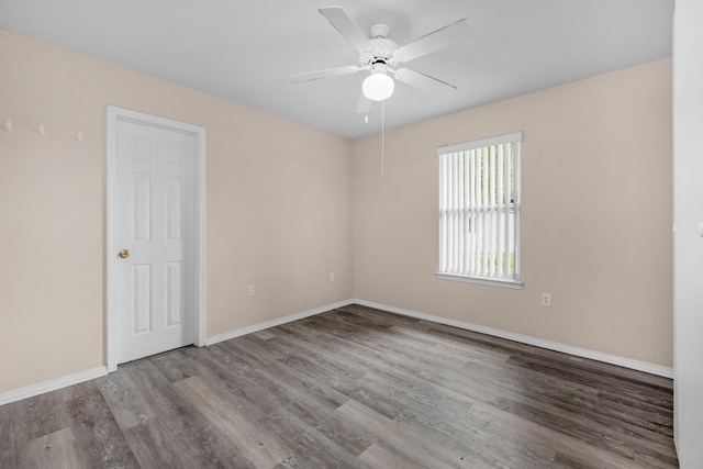 664 Brunson St, Crestview, FL 32536 - spare room featuring wood finished floors and a ceiling fan