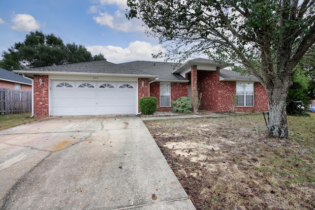 single story home with a garage