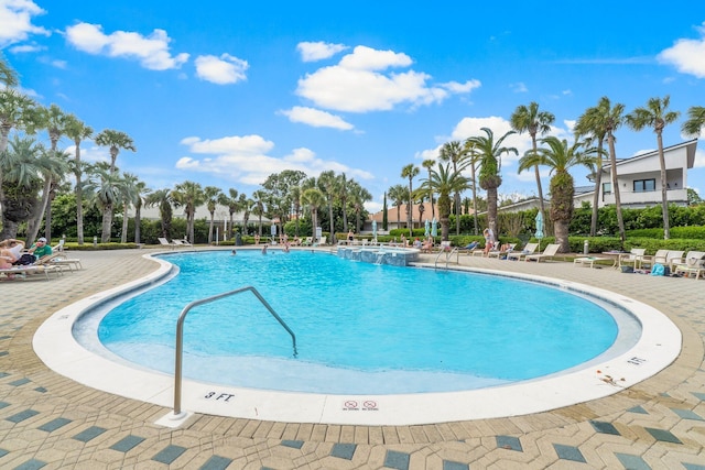 view of swimming pool featuring a patio area