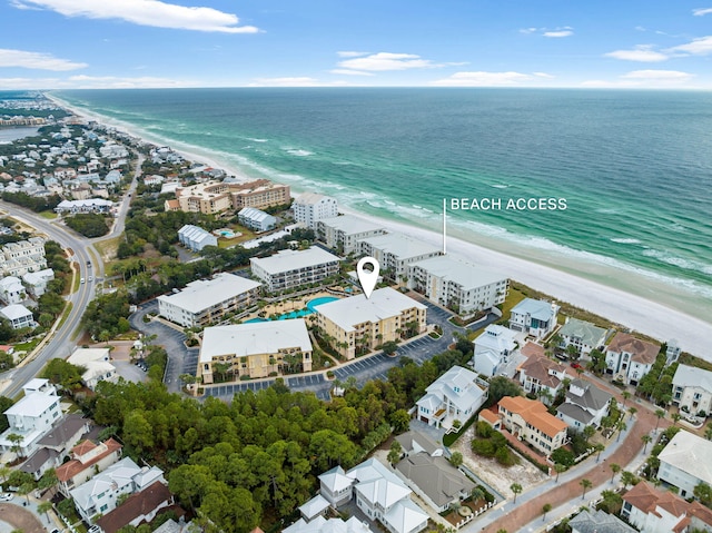 drone / aerial view with a view of the beach and a water view