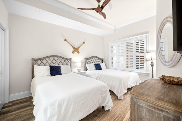 bedroom with ceiling fan, crown molding, and dark hardwood / wood-style floors