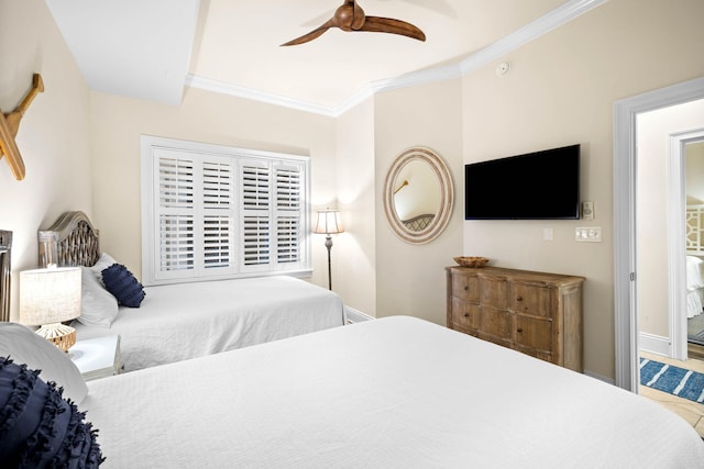 bedroom featuring ceiling fan and ornamental molding