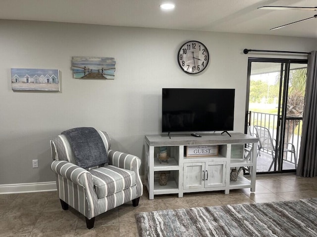 living area with tile patterned flooring