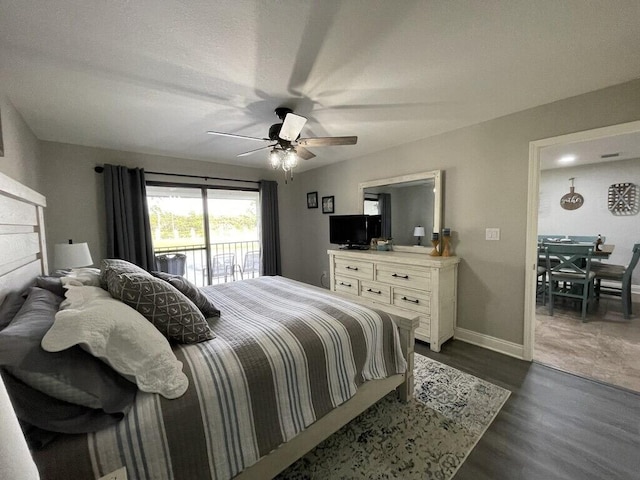 bedroom with ceiling fan, dark hardwood / wood-style flooring, and access to outside