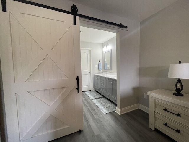 bathroom with wood-type flooring and vanity