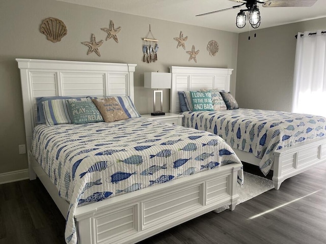 bedroom featuring dark hardwood / wood-style floors and ceiling fan