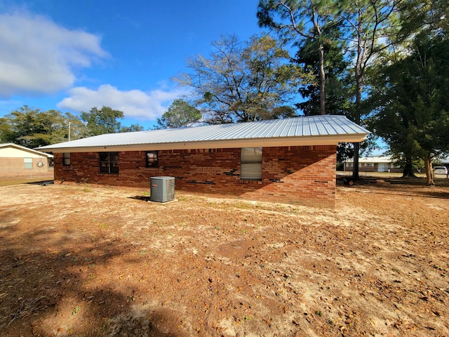 view of property exterior featuring central AC unit