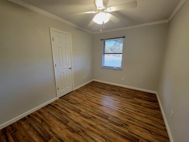 unfurnished room featuring ceiling fan, dark hardwood / wood-style floors, and ornamental molding