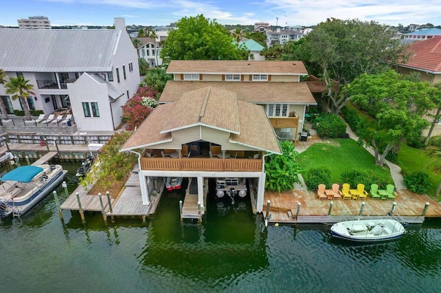 drone / aerial view featuring a water view