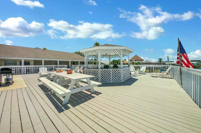 wooden deck with a gazebo