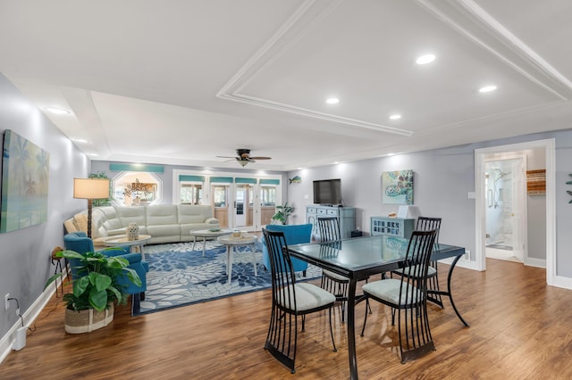 dining room featuring ceiling fan and wood-type flooring