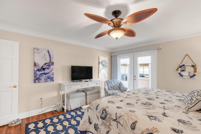 bedroom featuring ceiling fan, crown molding, wood-type flooring, and french doors