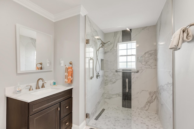 bathroom with crown molding, vanity, and an enclosed shower