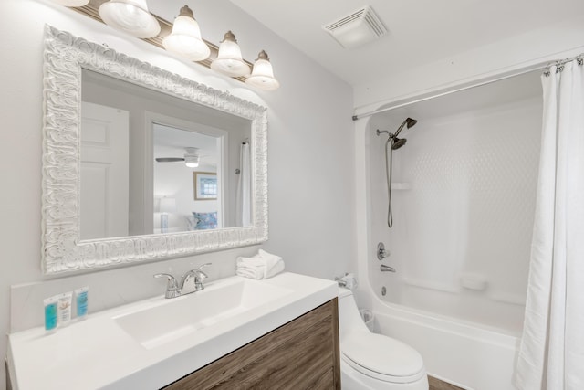 full bathroom with vanity, ceiling fan, toilet, and shower / tub combo with curtain