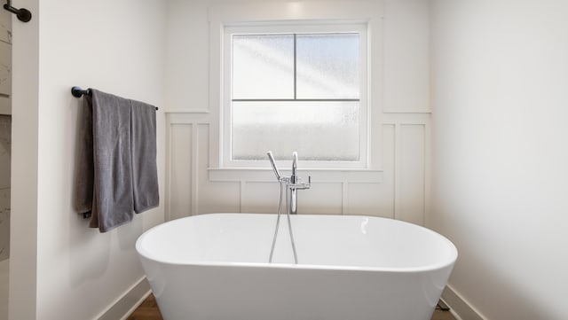 bathroom with a tub